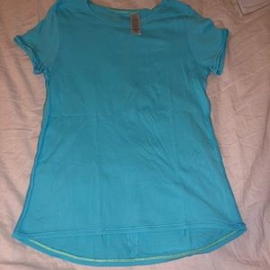 Aqua Ivivva sports shirt.